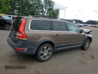 2014 Volvo XC70 3.2L z VIN YV4940BZ8E1178311, wystawiony jako Copart lot #58725065 z przebiegiem 100 278 mil mil oraz Szkoda całkowita • Salvage title. Historia ofert i sprzedaży dostępna na DreamBid. Obrazek 3.