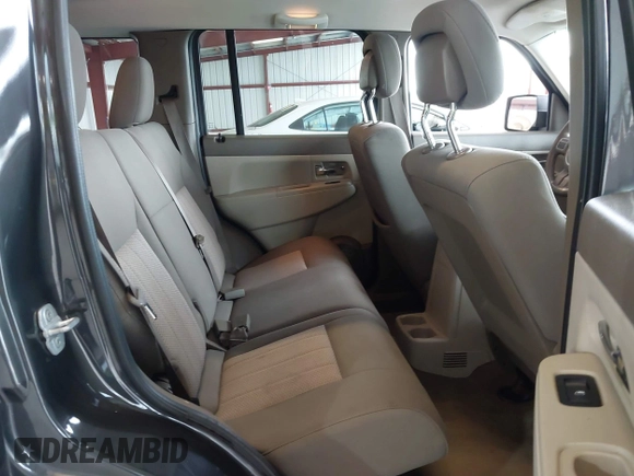 2011 Jeep Liberty Sport with VIN 1J4PN2GK8BW557672, listed as a IAAI auction lot 42260398 with 148,288 mi miles and . Bid and sale history available at DreamBid. Image 8.