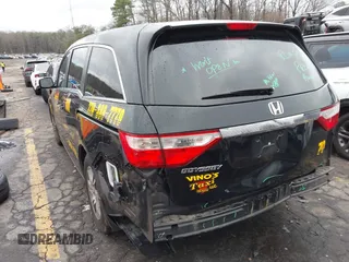 2012 Honda Odyssey EX-L with VIN 5FNRL5H64CB142247, listed as a IAAI auction lot 41722015 with 179,637 mi miles and . Bid and sale history available at carsss.com. Image 3.