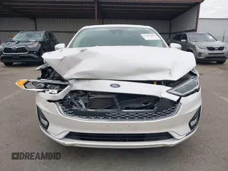 2020 Ford Fusion Titanium with VIN 3FA6P0K92LR103416, listed as a IAAI auction lot 41681810 with 54,902 mi miles and . Bid and sale history available at DreamBid. Image 12.