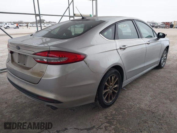 2017 Ford Fusion SE with VIN 3FA6P0H71HR214150, listed as a IAAI auction lot 41533148 with 125,654 mi miles. Bid and sale history available at carsss.com. Image 4.