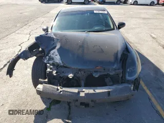 2004 Infiniti G35 w/Leather z VIN JNKCV54E94M816591, wystawiony jako Copart lot #57841935 z przebiegiem 176 606 mil mil oraz Szkoda całkowita • Salvage title. Historia ofert i sprzedaży dostępna na DreamBid. Obrazek 5.