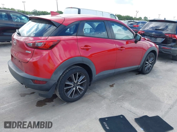2018 Mazda CX-3 Touring with VIN JM1DKDC7XJ0318219, listed as a IAAI auction lot 41941104 with 86,186 mi miles. Bid and sale history available at carsss.com. Image 4.
