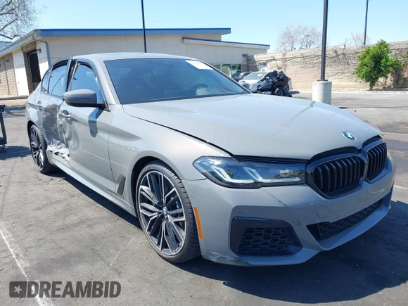 2021 BMW 5 Series M550i xDrive z VIN WBA13BK04MCF86288, wystawiony jako IAAI lot #41949946 z przebiegiem 40 944 mil mil oraz . Historia ofert i sprzedaży dostępna na DreamBid. Obrazek 1.