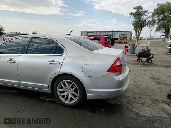 2012 Ford Fusion SEL with VIN 3FAHP0JG7CR257418, listed as a Copart auction lot 61842175 with 167,669 mi miles and Salvage title. Bid and sale history available at DreamBid. Image 14.