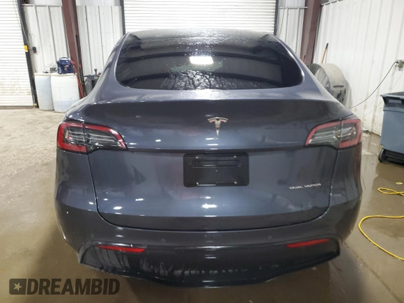 2022 Tesla Model Y Long Range with VIN 7SAYGDEE7NF422837, listed as a Copart auction lot 55271665 with 52,976 mi miles and Clean Title. Bid and sale history available at DreamBid. Image 6.