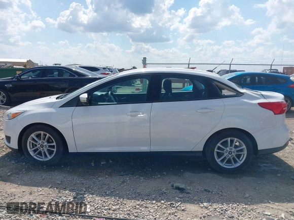 2015 Ford Focus SE with VIN 1FADP3F2XFL335884, listed as a IAAI auction lot 42582740 with 102,036 mi miles and . Bid and sale history available at DreamBid. Image 14.