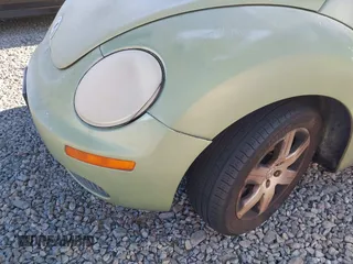2007 Volkswagen New Beetle Coupe with VIN 3VWRW31C57M519484, listed as a IAAI auction lot 41291687 with 203,516 mi miles. Bid and sale history available at carsss.com. Image 12.