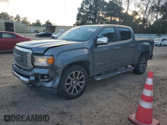 2020 GMC Canyon 4WD Denali with VIN 1GTG6EEN4L1245073, listed as a Copart auction lot 80462024 with 99,269 mi miles and Salvage Title. Bid and sale history available at carsss.com. Image 1.