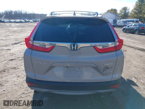 2017 Honda CR-V Touring with VIN 5J6RW2H94HL013536, listed as a IAAI auction lot 41577317 with 97,132 mi miles. Bid and sale history available at carsss.com. Image 16.