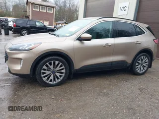 2021 Ford Escape Titanium Hybrid with VIN 1FMCU9DZXMUA66161, listed as a IAAI auction lot 41208651 with 61,198 mi miles and . Bid and sale history available at DreamBid. Image 14.