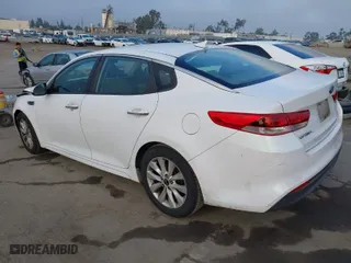 2016 Kia Optima LX with VIN 5XXGT4L34GG084299, listed as a IAAI auction lot 39779795 with 237,126 mi miles. Bid and sale history available at carsss.com. Image 3.