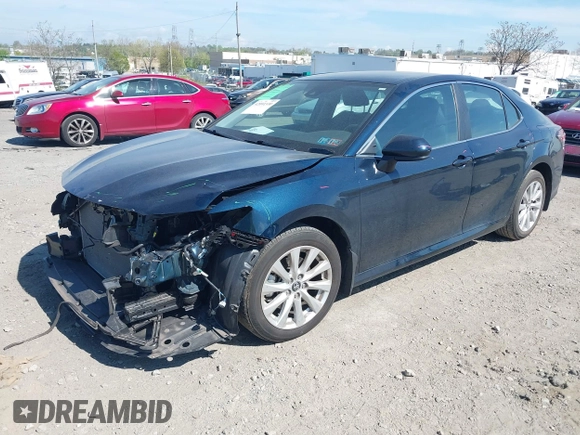 2019 Toyota Camry LE with VIN 4T1B11HK3KU254083, listed as a IAAI auction lot 42091530 with 26,635 mi miles and . Bid and sale history available at DreamBid. Image 17.