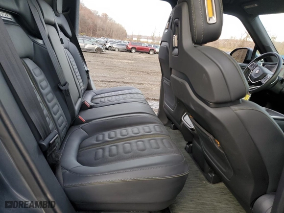 2023 Rivian R1T Adventure with VIN 7FCTGBAA8PN028065, listed as a Copart auction lot 81941474 with 16,060 mi miles and Salvage Title. Bid and sale history available at carsss.com. Image 10.