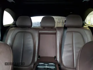 2017 BMW X1 xDrive28i z VIN WBXHT3Z39H4A57395, wystawiony jako Copart lot #56357845 z przebiegiem Nie podano mil oraz Szkody całkowita. Historia ofert i sprzedaży dostępna na DreamBid. Obrazek 10.
