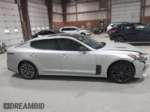 2018 Kia Stinger Premium with VIN KNAE25LA6J6021819, listed as a IAAI auction lot 41880827 with 119,214 mi miles. Bid and sale history available at carsss.com. Image 13.