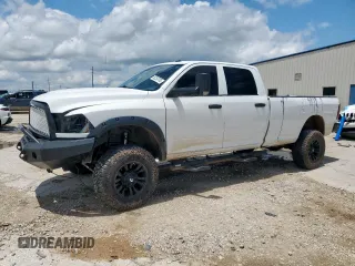 2014 Ram 2500 Tradesman with VIN 3C6UR5HL7EG212312, listed as a Copart auction lot 58259705 with 241,106 mi miles and Salvage title. Bid and sale history available at DreamBid. Image 1.