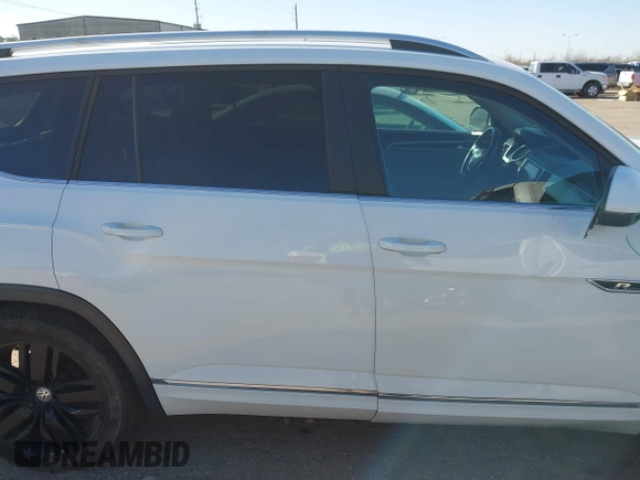 2018 Volkswagen Atlas SEL with VIN 1V2RR2CA1JC566065, listed as a IAAI auction lot 41687434 with 77,795 mi miles and . Bid and sale history available at DreamBid. Image 13.
