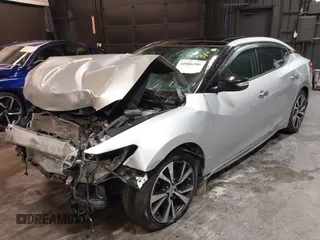 2016 Nissan Maxima SV z VIN 1N4AA6AP4GC415952, wystawiony jako IAAI lot #41806306 z przebiegiem 131 612 mil mil oraz . Historia ofert i sprzedaży dostępna na DreamBid. Obrazek 2.