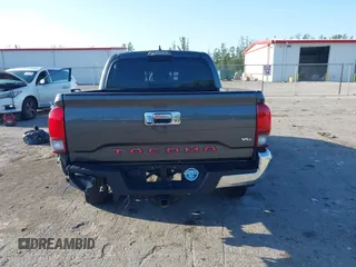2018 Toyota Tacoma SR5 with VIN 3TMAZ5CN4JM069965, listed as a IAAI auction lot 41798238 with 124,619 mi miles and . Bid and sale history available at DreamBid. Image 17.