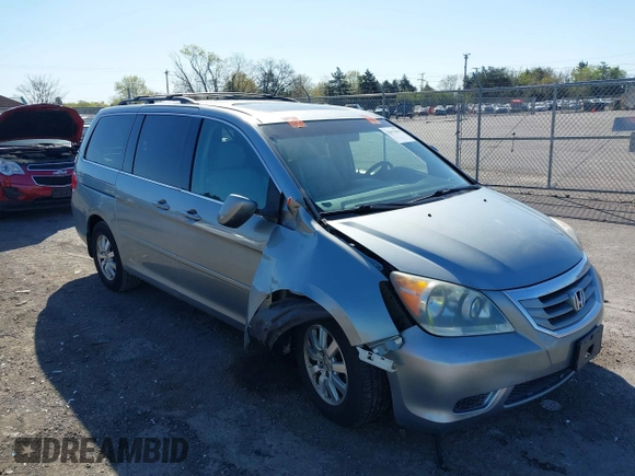 2009 Honda Odyssey EX-L with VIN 5FNRL38729B032786, listed as a IAAI auction lot 42012590 with 188,552 mi miles. Bid and sale history available at carsss.com. Image 1.