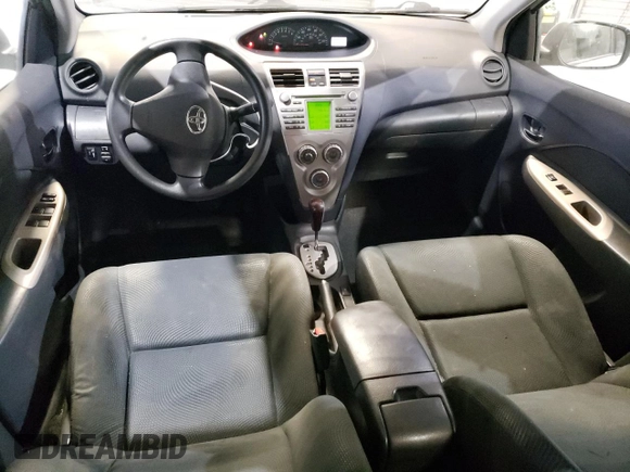 2010 Toyota Yaris with VIN JTDBT4K3XA1382385, listed as a Copart auction lot 48544795 with 169,664 mi miles and Salvage Title. Bid and sale history available at DreamBid. Image 8.