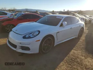 2016 Porsche Panamera 4 with VIN WP0AA2A74GL001198, listed as a Copart auction lot 89090385 with 86,571 mi miles and Salvage Title. Bid and sale history available at DreamBid. Image 1.
