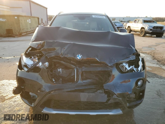 2018 BMW X1 xDrive28i with VIN WBXHT3C30J5K23793, listed as a Copart auction lot 42944555 with 72,250 mi miles and Salvage Title. Bid and sale history available at carsss.com. Image 5.