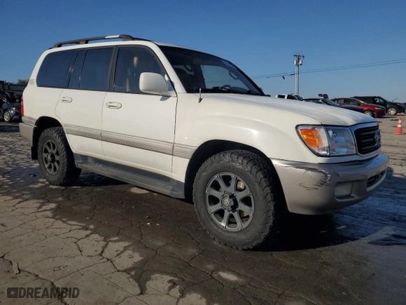 1999 Toyota Land Cruiser with VIN JT3HT05J8X0049750, listed as a Copart auction lot 77547144 with 168,435 mi miles and Salvage Title. Bid and sale history available at carsss.com. Image 4.