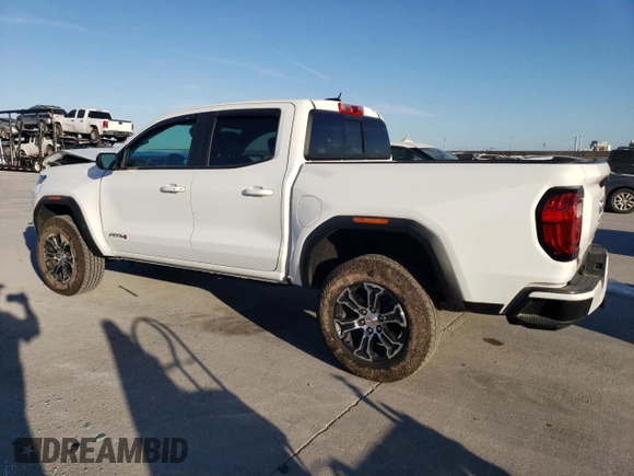 2023 GMC Canyon 4WD AT4 with VIN 1GTP6DEK6P1237045, listed as a Copart auction lot 74981784 with 18,036 mi miles and Salvage Title. Bid and sale history available at carsss.com. Image 2.
