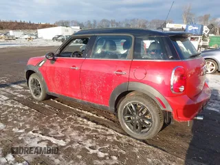 2013 MINI Countryman S z VIN WMWZC3C58DWP22372, wystawiony jako IAAI lot #41523123 z przebiegiem 50 410 mil mil oraz . Historia ofert i sprzedaży dostępna na DreamBid. Obrazek 3.