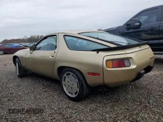 1984 Porsche 928 z VIN WP0JB092XES862382, wystawiony jako Copart lot #79716354 z przebiegiem 117 599 mil mil oraz Szkody całkowita. Historia ofert i sprzedaży dostępna na DreamBid. Obrazek 2.