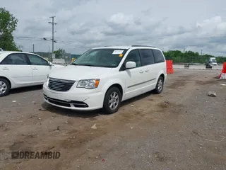 2011 Chrysler Town & Country Touring with VIN 2A4RR5DG9BR775238, listed as a IAAI auction lot 42162442 with 180,408 mi miles and . Bid and sale history available at DreamBid. Image 2.