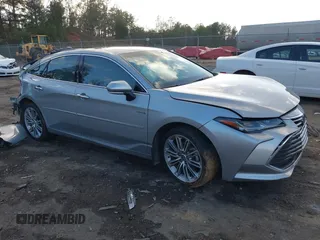 2021 Toyota Avalon Limited Hybrid z VIN 4T1DA1AB1MU010065, wystawiony jako IAAI lot #41083757 z przebiegiem 65 749 mil mil oraz . Historia ofert i sprzedaży dostępna na DreamBid. Obrazek 1.