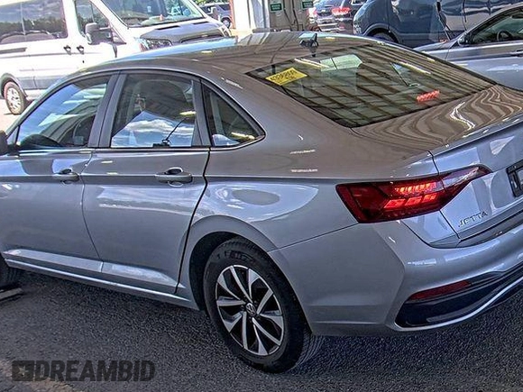 2024 Volkswagen Jetta S with VIN 3VW5M7BU8RM051840, listed as a IAAI auction lot 42852799 with 14,434 mi miles and . Bid and sale history available at DreamBid. Image 2.