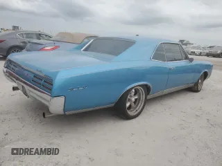 1967 Pontiac GTO z VIN 242177Z109196, wystawiony jako Copart lot #74348844 z przebiegiem Nie podano mil oraz Szkoda całkowita • Salvage title. Historia ofert i sprzedaży dostępna na DreamBid. Obrazek 3.