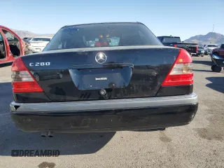 1994 Mercedes-Benz C z VIN WDBHA28E3RF075327, wystawiony jako Copart lot #57819825 z przebiegiem 83 224 mil mil oraz Szkoda całkowita • Salvage title. Historia ofert i sprzedaży dostępna na DreamBid. Obrazek 6.
