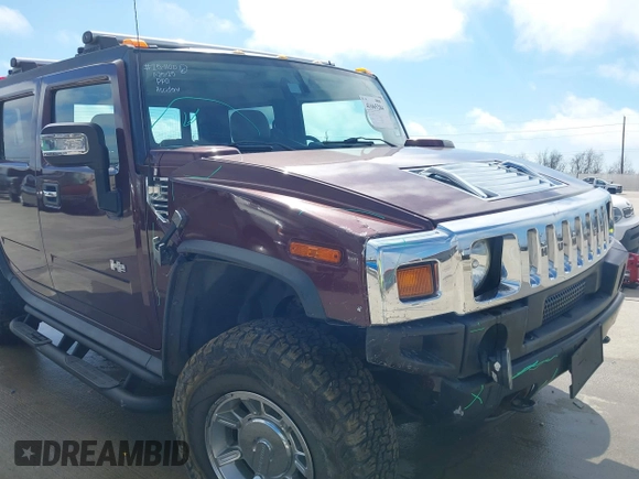 2006 Hummer H2 with VIN 5GRGN22U66H104237, listed as a IAAI auction lot 41665284 with 61,984 mi miles. Bid and sale history available at carsss.com. Image 6.