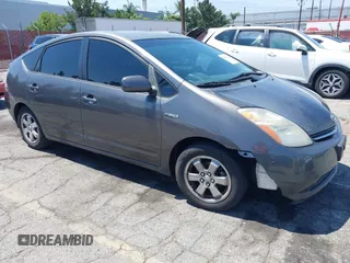 2007 Toyota Prius z VIN JTDKB20U373233106, wystawiony jako IAAI lot #42479025 z przebiegiem Nie podano mil oraz . Historia ofert i sprzedaży dostępna na DreamBid. Obrazek 1.