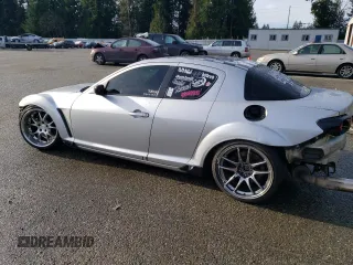 2005 Mazda RX-8 with VIN JM1FE173150149736, listed as a Copart auction lot 87021634 with 90,465 mi miles and Salvage Title. Bid and sale history available at carsss.com. Image 2.