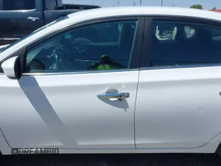 2019 Nissan Sentra S z VIN 3N1AB7AP5KY285776, wystawiony jako IAAI lot #41969976 z przebiegiem 87 187 mil mil oraz . Historia ofert i sprzedaży dostępna na DreamBid. Obrazek 15.
