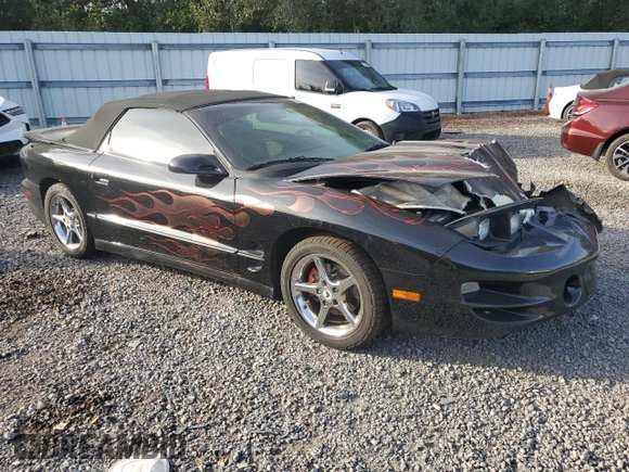 1999 Pontiac Firebird Trans Am with VIN 2G2FV32G1X2217352, listed as a Copart auction lot 79941714 with 174,580 mi miles and Salvage title. Bid and sale history available at DreamBid. Image 4.