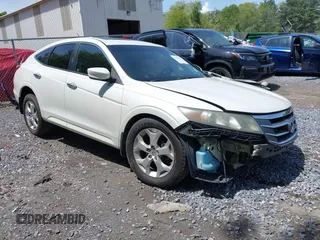 2010 Honda Crosstour EX-L z VIN 5J6TF2H54AL015764, wystawiony jako IAAI lot #42345212 z przebiegiem 141 712 mil mil oraz . Historia ofert i sprzedaży dostępna na DreamBid. Obrazek 1.