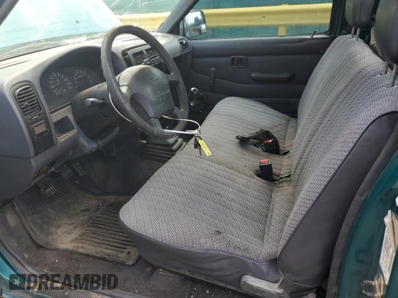 1997 Nissan Frontier XE with VIN 1N6SD11SXVC332100, listed as a Copart auction lot 54330245 with 203,959 mi miles and Salvage title. Bid and sale history available at DreamBid. Image 7.