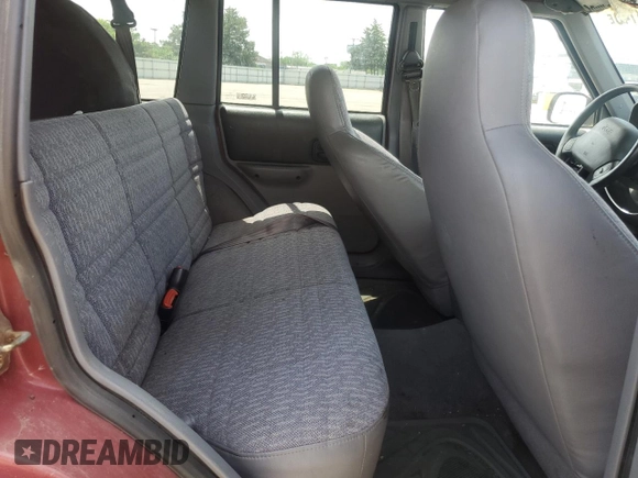 1998 Jeep Cherokee Sport with VIN 1J4FJ68S2WL285432, listed as a Copart auction lot 57183145 with 284,162 mi miles and Clean title. Bid and sale history available at DreamBid. Image 11.