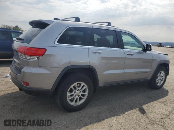 2018 Jeep Grand Cherokee Laredo E with VIN 1C4RJFAG0JC351090, listed as a Copart auction lot 52958635 with 96,956 mi miles and Salvage Title. Bid and sale history available at DreamBid. Image 3.