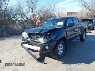 2009 Toyota Tacoma PreRunner with VIN 3TMJU62N99M074807, listed as a IAAI auction lot 41664211 with 230,481 mi miles. Bid and sale history available at carsss.com. Image 2.