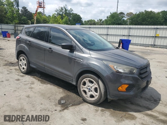 2018 Ford Escape S with VIN 1FMCU0F7XJUA71377, listed as a Copart auction lot 53922215 with 57,459 mi miles and Salvage title. Bid and sale history available at DreamBid. Image 4.
