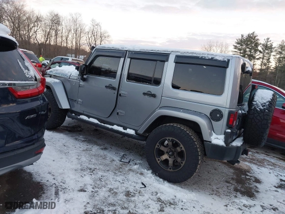 2015 Jeep Wrangler Unlimited Rubicon Hard Rock with VIN 1C4HJWFG1FL659803, listed as a IAAI auction lot 41172485 with 126,881 mi miles. Bid and sale history available at carsss.com. Image 3.