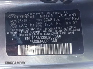 2016 Hyundai Veloster with VIN KMHTC6AD3GU283985, listed as a IAAI auction lot 41872103 with 153,949 mi miles. Bid and sale history available at carsss.com. Image 9.